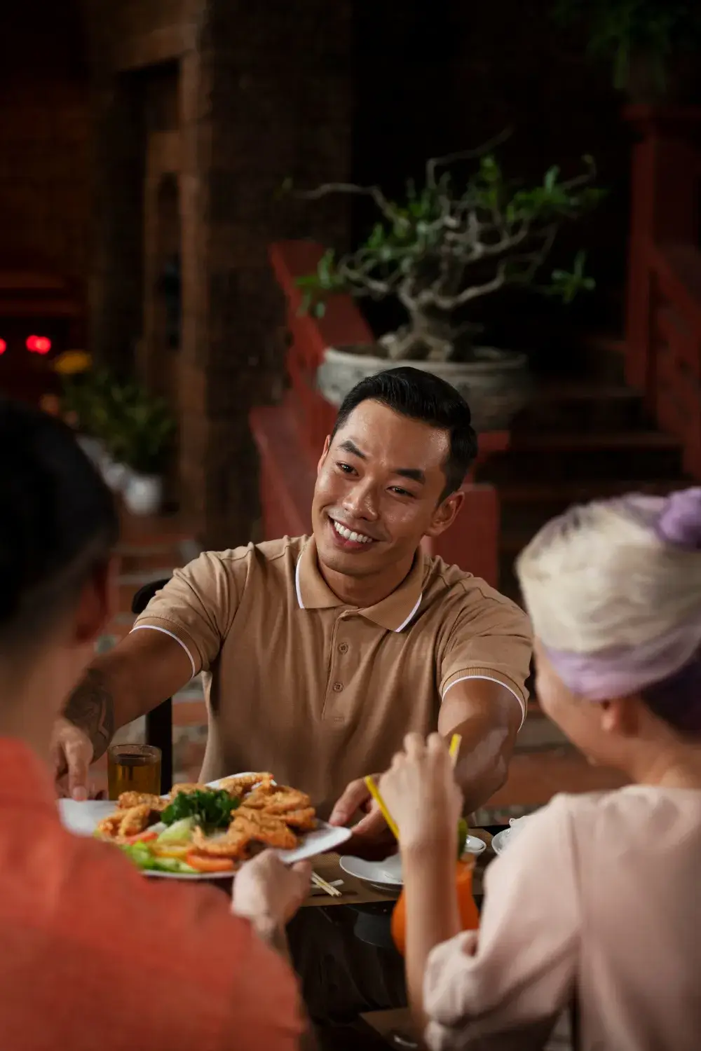 Filipino family enjoying dining out
